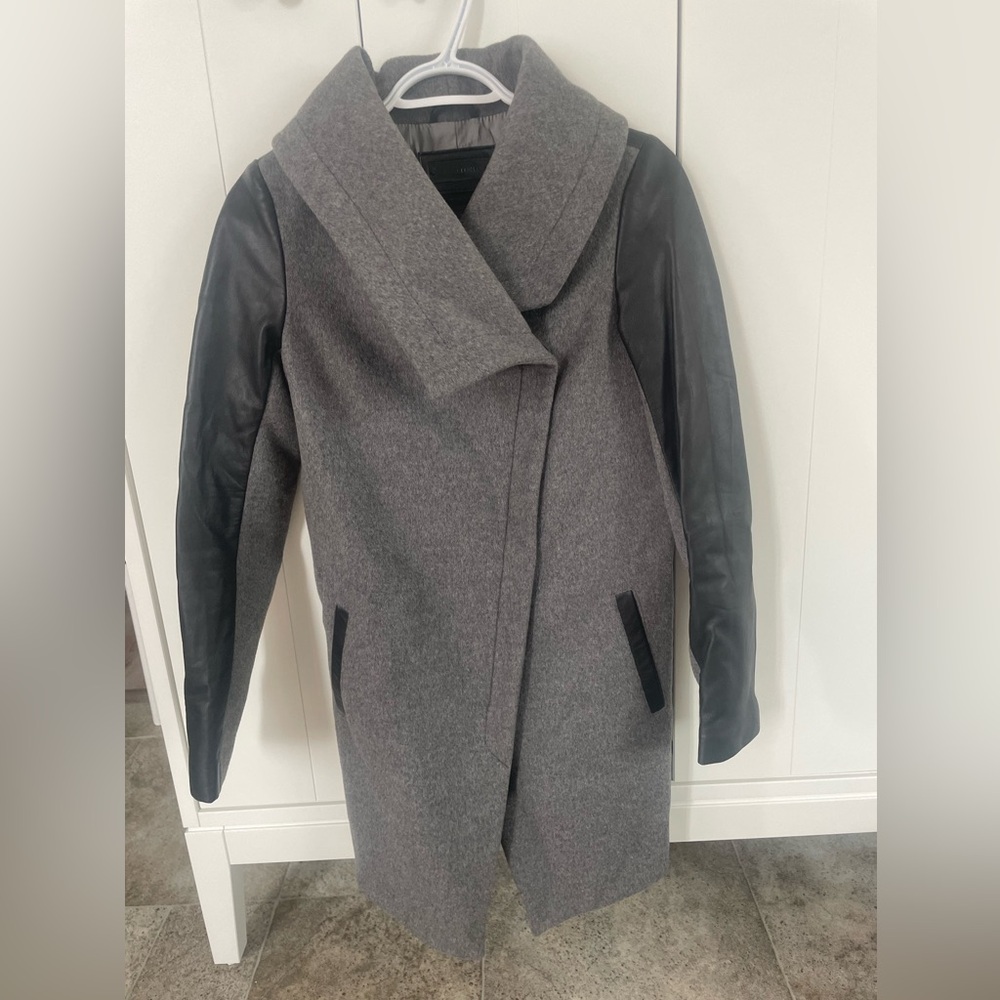 Leather jacket like new .only work a few times